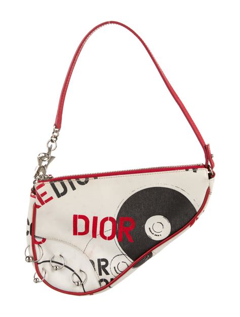 dior mini saddle pierced